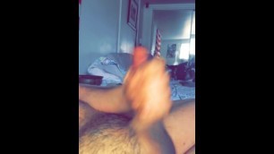 Stroking my hard cock. :-)