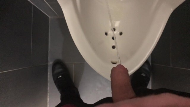 Take a piss in the urinal at work. Uncut guy handsfree
