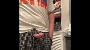 Hung teen pulls cock out of sweatpants and plays with it