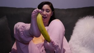 Hot Girl in Pajamas Peels a Banana with Her Feet