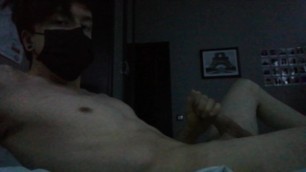 Fit teen in a mask cums when his parents aren't at home