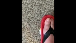 Trampling squishy in red flip flops