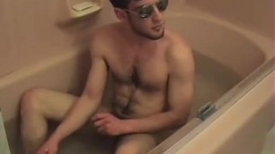 Hunk Jacks off in the tub