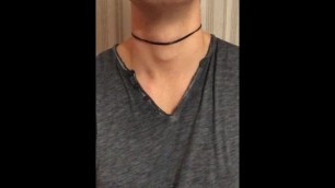 guy swallowing with a tight lace around his neck