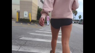 Candid voyeur teen in tiny gym shorts ass shopping legs