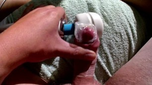 Small cock cumming in condom, tortured by Hitachi Wand