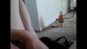 cumming in living room on a bottle