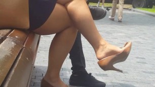 Tight pumps and crossed legs