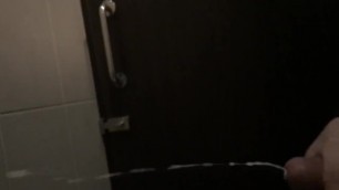 Jerking off in a public toilet and shooting a big load