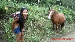 HD peeing next to horse in jungle