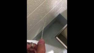 Pissing Shamelessly on the wall in Public Bathroom