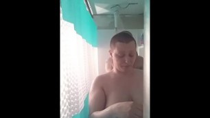 Bald girl and guy in Shower