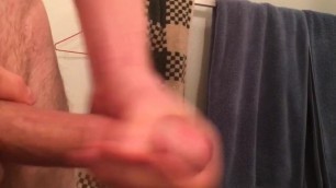 Young guy strokes big hung white dick and cums