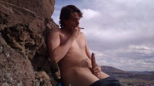 Twink shoots huge load smoking outdoors