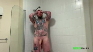 Big dick tattooed straight hunks jerks his massive meat in the shower