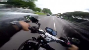 this motorcyclist speeding through traffic