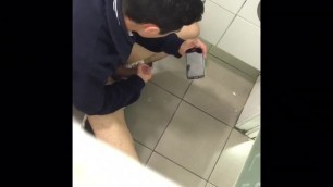 A young student beating one inside the school bathroom.