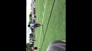 Very young teen at football camp