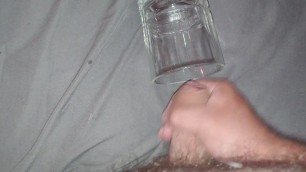 Solo masturbation cumshot into glass cup