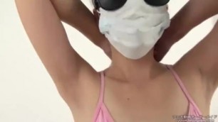 Asian girl showing her armpits