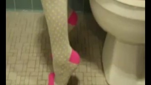 peeing in gray socks