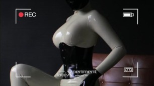 Model in latex catsuit