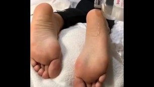 PUTTING OIL ON HER BIG SOLES!