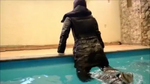 Sexy girl swimming with down coat and wet look leggings
