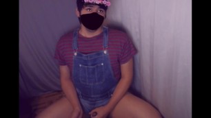 Sissy in overalls masturbating
