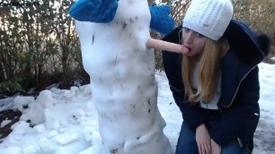 Blonde in Blue Puffy Jacket and Fur Hood Snowman Blowjob