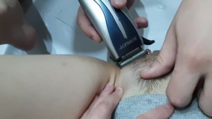 Guy shaves his girlfriend's pussy. The girl was excited Wet pussy homemade