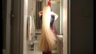 Blond very long hair brushing