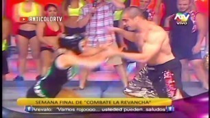 muscular professional male fighter humiliated by girl in wrestling match