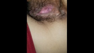 Opening and closing wifes hairy dirty pussy.