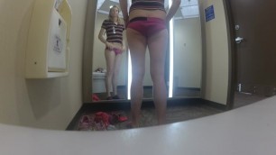 T-Girl tryin on clothes in the changing room,.