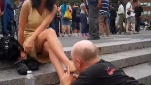 Guy Licks Feet of a Random Woman on a Public Street