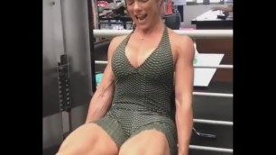 ripped fit girl screams hard performing hellish static leg extensions set