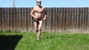 A daddy running naked, dancing, singing, flashing, and penis playing.