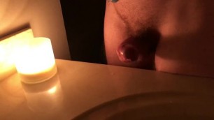 I masterbate by candlelight then cum on the counter