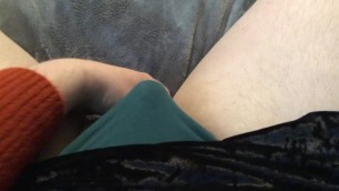 Sissy plays with tiny cock through skirt