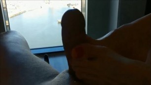 Footjob in heights, cum on feet at the end. Red sexy toenails!