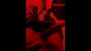 Big black oiled up dick in red light