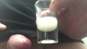 I filled half a shot glass first with a strong powerful cumshot followed sh