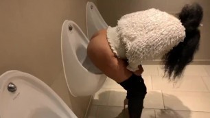 London girl uses urinal in mens toilet