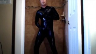 Spandex boy oiling myself in catsuit