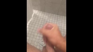 Jacking off in the gym showers. HUGE LOAD!