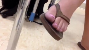 College feet close up in Rainbow Sandals