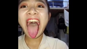girl show her sexy tongue