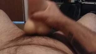 Guy playing with toy, cumshot at end