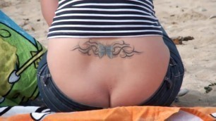 Womans sexy crack on the beach